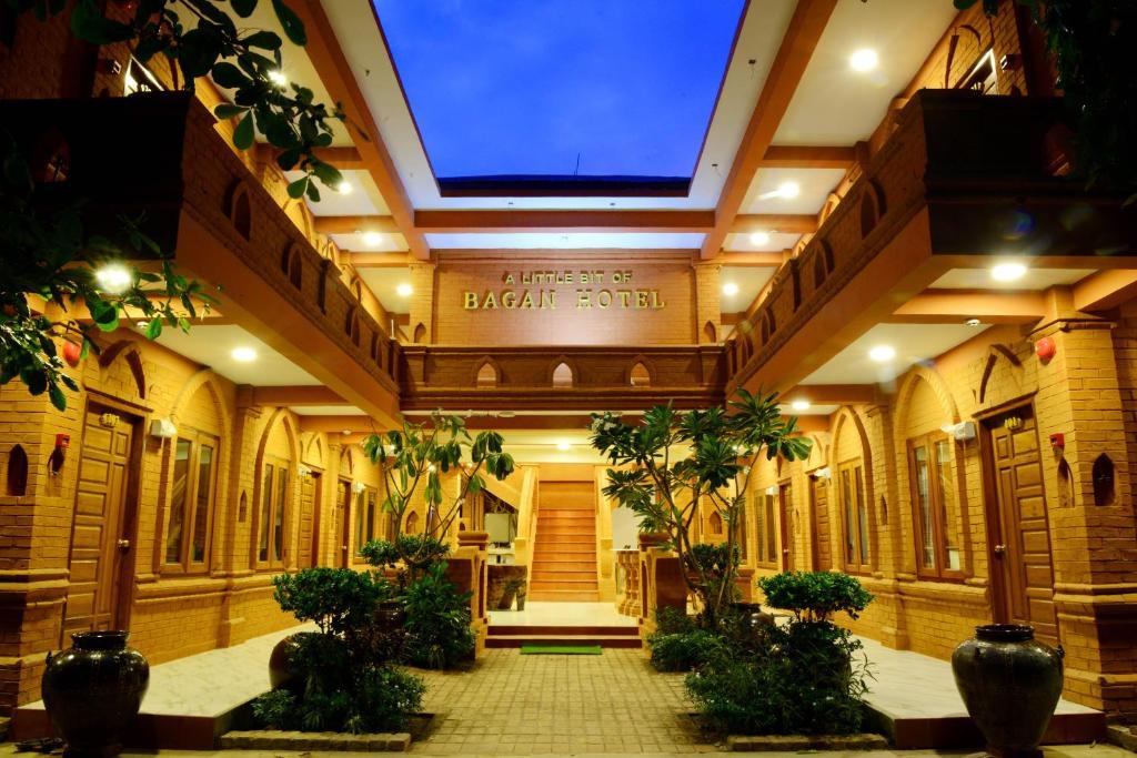 The warmly lit courtyard at A Little Bit of Bagan Hotel